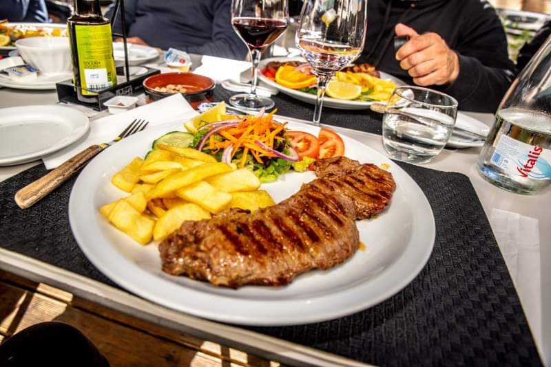 Dining experience at Adega do Peixe - authentic Portuguese seafood in Quarteira, Algarve